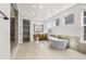 Serene bathroom with a freestanding tub, walk-in shower, and double vanity with modern fixtures at 6529 Still Pine Cir, Castle Pines, CO 80108