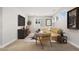 Comfortable living room with plush sectional sofa, modern decor, and entertainment center at 6529 Still Pine Cir, Castle Pines, CO 80108