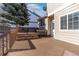 This backyard has a wooden deck and features a multi-level yard and a neutral exterior color scheme at 1018 Mulberry Ln, Highlands Ranch, CO 80129