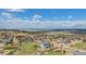 Aerial view showcasing a residential area with houses, landscaping and open land at 7692 Weaver Cir, Castle Rock, CO 80104