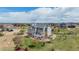 Aerial shot of this fantastic home, showcasing its expansive lot and well-manicured lawn at 7692 Weaver Cir, Castle Rock, CO 80104