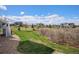 Expansive backyard offering lots of green space and room to enjoy outdoor activities at 7692 Weaver Cir, Castle Rock, CO 80104