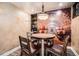 Unique dining area with mural artwork and custom lighting at 7692 Weaver Cir, Castle Rock, CO 80104