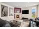 Cozy living room features a stone fireplace and open layout at 7692 Weaver Cir, Castle Rock, CO 80104