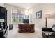 Home office space with natural light and an executive desk with a comfortable leather chair at 7692 Weaver Cir, Castle Rock, CO 80104