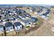 Aerial view of a modern community and surrounding mountains at 490 Silver Rock Trl, Castle Rock, CO 80104