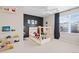 Fun bedroom with a race car theme and lots of light at 490 Silver Rock Trl, Castle Rock, CO 80104