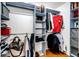 A well-organized walk-in closet with built-in shelving, hanging rods, and ample storage space at 10890 Willow Reed West Cir, Parker, CO 80134