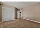 Bedroom showcasing plush carpeting, a walk-in closet, and neutral walls providing a blank canvas at 7949 S Elk Way, Aurora, CO 80016