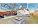 This charming backyard has a fire pit, outdoor seating, jacuzzi, grill, and second story patio at 3825 Tejon St, Denver, CO 80211