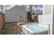 Backyard featuring a studio, a stone fire pit, outdoor staircase, and a luxurious hot tub at 3825 Tejon St, Denver, CO 80211