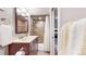 Bathroom with a shower, single sink vanity and modern fixtures at 3825 Tejon St, Denver, CO 80211