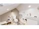 Well-lit bathroom with modern fixtures, stylish tiling, and a convenient toilet at 3825 Tejon St, Denver, CO 80211