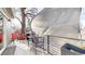 Outdoor deck space with furniture and a retractable awning at 3825 Tejon St, Denver, CO 80211