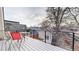 Outdoor deck area with a table and chairs, perfect for enjoying the view and fresh air at 3825 Tejon St, Denver, CO 80211