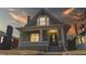 Charming home with a classic front porch and meticulously landscaped yard, perfect for enjoying evenings outside at 3825 Tejon St, Denver, CO 80211
