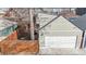 Backyard shot of a garage with a private outdoor staircase to a second level at 3825 Tejon St, Denver, CO 80211