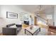 Stylish living room with hardwood floors, modern decor, and seamless flow to other spaces at 3825 Tejon St, Denver, CO 80211