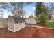 Outdoor storage sheds on a lot with natural mulch ground cover at 60 Yarrow St, Lakewood, CO 80226