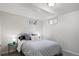 Simple bedroom with a bed and two windows, providing natural light at 60 Yarrow St, Lakewood, CO 80226
