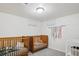 Bright Bedroom featuring two wooden cribs, neutral walls, and ample natural light at 60 Yarrow St, Lakewood, CO 80226