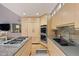 Contemporary kitchen with stainless steel appliances, ample counter space, and custom cabinetry at 3816 Spring Valley Trl, Evergreen, CO 80439