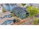 Aerial view of two-story home with backyard and solar panels, nestled amongst other attractive homes at 2119 W 101St Cir, Thornton, CO 80260