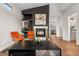 Inviting living room featuring a stylish fireplace, modern decor, and an open layout at 2119 W 101St Cir, Thornton, CO 80260