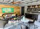 Outdoor living space featuring a seating area, outdoor bar, and ceiling fan at 2725 N Gaylord St, Denver, CO 80205
