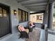 Cozy porch seating area with comfortable chairs and an outdoor rug at 2725 N Gaylord St, Denver, CO 80205