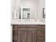 Beautiful bathroom with a modern vanity, sleek faucet, and ample counter space at 2828 N Federal Blvd, Denver, CO 80211