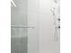 Modern shower featuring sleek chrome fixtures and a shower head at 2828 N Federal Blvd, Denver, CO 80211