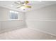 Clean basement space with carpet, neutral paint and ceiling fan at 6183 Xavier St, Arvada, CO 80003