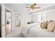 Spacious main bedroom with ensuite bathroom and a comfortable sitting area at 6183 Xavier St, Arvada, CO 80003
