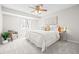 Serene main bedroom with soft natural light, neutral tones, and plush carpeting at 6183 Xavier St, Arvada, CO 80003
