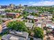 This is an aerial view of a home situated in a neighborhood with a blend of residential and commercial buildings at 1024 34Th St, Denver, CO 80205