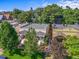 An aerial close-up showing a home with a charming front porch and a well-manicured front yard at 1024 34Th St, Denver, CO 80205