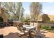 Entertaining back deck with a built-in outdoor kitchen and spacious seating area perfect for summer gatherings at 1437 Cassin Ct, Boulder, CO 80303
