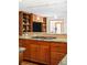 Kitchen with modern appliances, built in shelves, hardwood floors and granite counter tops at 1437 Cassin Ct, Boulder, CO 80303