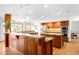 Bright kitchen with stainless appliances, hardwood flooring, granite countertops and recessed lights at 1437 Cassin Ct, Boulder, CO 80303