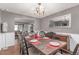 Spacious dining room with hardwood floors, ample seating, and view to the Living Room at 18434 E Belleview Ln, Centennial, CO 80015
