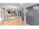 View from the kitchen, showing the dining area and fireplace at 18434 E Belleview Ln, Centennial, CO 80015