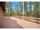 Exterior deck overlooking the forest at 9530 Aspen Ln, Conifer, CO 80433