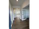 Inviting entryway with wood floors, bright lighting, and an open floor plan at 2145 S Ider Way, Aurora, CO 80018