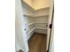 Walk-in pantry with ample shelving for organized storage at 2145 S Ider Way, Aurora, CO 80018