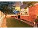 Charming backyard with patio, lawn, trees and beautiful sunset views, enhancing the outdoor living experience at 12411 Irving Dr, Broomfield, CO 80020