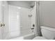 Clean bathroom featuring a shower and tub with white subway tile surround at 12411 Irving Dr, Broomfield, CO 80020