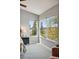 Bedroom view with several large windows and scenic outdoor views, providing lots of natural light at 12411 Irving Dr, Broomfield, CO 80020