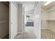 Hallway view leading into bedroom closets and the bathroom area at 12411 Irving Dr, Broomfield, CO 80020