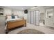 Finished basement bedroom area with sleeping area separated from a sitting area with a partition at 1376 Banner Cir, Erie, CO 80516